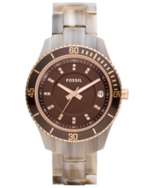A modern take on casual cool, this rosy-hued Stella collection watch by Fossil is an everyday treat. A modern take on casual cool, this rosy-hued Stella collection watch by Fossil is an everyday treat.