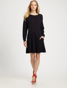 In a cozy wool-cotton blend and a laid-back silhouette, this gorgeous dress is both sporty and chic.Boat neckLong sleeves with ribbed tapered cuffsZip side pocketsFull skirtBack vent with silk insertAbout 21 from natural waist54% merino wool/46% cottonSilk trimDry cleanImported