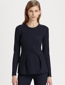 Finished with a sophisticated peplum hem, this stretchy crewneck has intricate stitching that forms a bodice-like silhouette. CrewneckLong sleevesPeplum hemInvisible back zipper72% viscose/23% polyamide/5% elastaneDry cleanImported of Italian fabricModel shown is 5'10 (177cm) wearing US size 2.