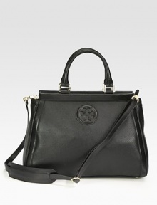 An elegant design in pebbled leather with smooth leather trim and a signature logo emblem.Double top handles, 5½ dropDetachable adjustable shoulder strap, 14-23 dropTop zip closureOne inside zip pocketTwo inside open pocketsOne detachable mirrorCotton lining15W X 11H X 4DImported An elegant design in pebbled leather with smooth leather trim and a signature logo emblem.Double top handles, 5½ dropDetachable adjustable shoulder strap, 14-23 dropTop zip closureOne inside zip pocketTwo inside open pocketsOne detachable mirrorCotton lining15W X 11H X 4DImported