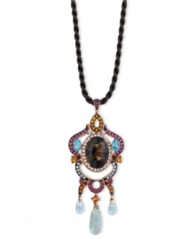 Illuminate your look with a spectrum of color. Le Vian's intricate chandelier pendant combines oval-cut smokey quartz (6-3/4 ct. t.w.), oval and round-cut blue topaz (1-1/4 ct. t.w.), round-cut rhodolite (3/4 ct. t.w.), round-cut citrine (1/2 ct. t.w.), round-cut green amethyst (3-1/5 ct. t.w.), round-cut white topaz (3/8 ct. t.w.) and marquise-cut garnet (3 ct. t.w.). Set in 14k rose gold and strung from a brown silk cord. Approximate length: 18 inches. Approximate drop: 2-3/4 inches.