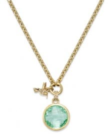 Hum a charming tune with this Juicy Couture charm necklace. A circular glass stone in shimmering green hues is paired with a hummingbird charm for a darling finishing touch. Crafted in gold tone mixed metal. Approximate length: 16 inches. Approximate drop: 1-1/2 inches.