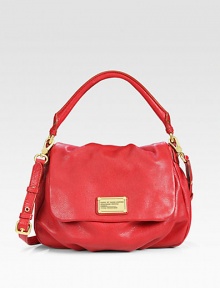 Supple pebbled leather bag with dual straps that can be worn across the body or along the shoulder for a truly versatile style. Top handle, 4½ dropAdjustable detachable shoulder strap, 15½-19¼ dropMagnetic flap closureTwo inside pocketsOne inside zip pocketFully lined13W X 11H X 4½DImportedPlease note: Hardware color varies by bag. Supple pebbled leather bag with dual straps that can be worn across the body or along the shoulder for a truly versatile style. Top handle, 4½ dropAdjustable detachable shoulder strap, 15½-19¼ dropMagnetic flap closureTwo inside pocketsOne inside zip pocketFully lined13W X 11H X 4½DImportedPlease note: Hardware color varies by bag.