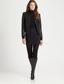 A vision of edginess, this stretch mini features super-soft lambskin leather details and timeless waist darts for a fantastic fit.Leather side detailsBack waist dartsConcealed back zipperFully linedAbout 18 longCotton/nylon/elastaneDry clean by leather specialistImported Model shown is 5'10 (177cm) wearing US size 4. A vision of edginess, this stretch mini features super-soft lambskin leather details and timeless waist darts for a fantastic fit.Leather side detailsBack waist dartsConcealed back zipperFully linedAbout 18 longCotton/nylon/elastaneDry clean by leather specialistImported Model shown is 5'10 (177cm) wearing US size 4.