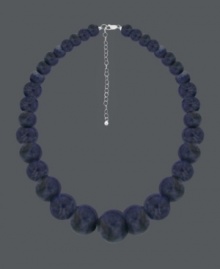 Smooth out your look in earth-tones and subtle design. Avalonia Road necklace features graduated, sodalite beads (6-1/2-22 mm) with a sterling silver clasp. Approximate length: 16 inches. Smooth out your look in earth-tones and subtle design. Avalonia Road necklace features graduated, sodalite beads (6-1/2-22 mm) with a sterling silver clasp. Approximate length: 16 inches.