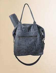 A perfect little carryall for life on the go with baby, in stylishly distressed leather in slouchy silhouette with top zip closure, detachable shoulder strap, stroller clips, matching changing pad and plenty of convenient pockets.Double top handles, 9.5 dropTop zip closureDetachable