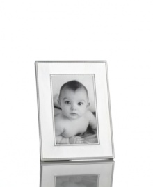 Delicately beaded edges add to the resplendent beauty of this Silver Bead picture frame from Martha Stewart Collection. Simply timeless in brilliant silver plate, it brings new attention to the past. With velvet backing. Delicately beaded edges add to the resplendent beauty of this Silver Bead picture frame from Martha Stewart Collection. Simply timeless in brilliant silver plate, it brings new attention to the past. With velvet backing.
