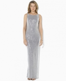 Lauren Ralph Lauren's bold sequin gown is crafted with a slit at the leg and an elegant draped back to create a glamorous evening look.