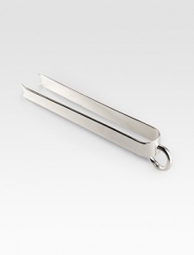 A stunning touch crafted in France from high-polish silver, featuring designer Andree Putman's signature asymmetric ring. From the Vertigo collection 8 long Silverplate Imported 