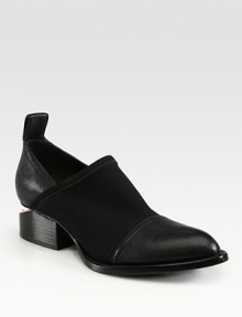 Cutout heel, back pull tab and ultra-stretchy elastic update this classic leather look. Stacked cutout heel, 2 (50mm)Leather and elastic upperLeather lining and solePadded insoleImportedOUR FIT MODEL RECOMMENDS ordering one half size up as this style runs small. Cutout heel, back pull tab and ultra-stretchy elastic update this classic leather look. Stacked cutout heel, 2 (50mm)Leather and elastic upperLeather lining and solePadded insoleImportedOUR FIT MODEL RECOMMENDS ordering one half size up as this style runs small.