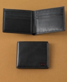 Avoid the back-pocket bulge and take just the essentials in this slim billfold wallet from Tumi.