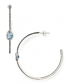 Add prismatic sparkle to your accessorizing mantra with this pair of silver and crystal hoop earrings from Judith Jack. In a just-right size with delicate in-set detailing, this pair epitomizes easy chic.