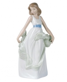 Celebrate eternal youth and beauty with this elegant handmade porcelain figurine from Lladró. An ideal gift that sparks care-free joy within any special someone. Celebrate eternal youth and beauty with this elegant handmade porcelain figurine from Lladró. An ideal gift that sparks care-free joy within any special someone.