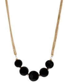 Black isn't back, but rather it's front and center in this frontal necklace from Kenneth Cole New York. Suspended from chains crafted from gold-tone mixed metal are black semi-precious beads. Glass pave accents add luster. Approximate length: 16 inches + 3-inch extender. Approximate drop: 3/4 inch. Black isn't back, but rather it's front and center in this frontal necklace from Kenneth Cole New York. Suspended from chains crafted from gold-tone mixed metal are black semi-precious beads. Glass pave accents add luster. Approximate length: 16 inches + 3-inch extender. Approximate drop: 3/4 inch.