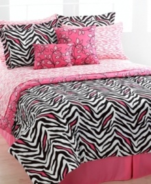 It's a jungle out there! The Zenia Zebra reversible comforter set takes you on a style safari with a bold zebra and vine prints in chic black, white and pink. The comforter, shams, sheeting and decorative pillows are all reversible, giving you endless mix and match options. It's a jungle out there! The Zenia Zebra reversible comforter set takes you on a style safari with a bold zebra and vine prints in chic black, white and pink. The comforter, shams, sheeting and decorative pillows are all reversible, giving you endless mix and match options.
