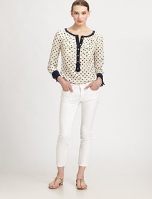 Allover polka dots, an ultra-feminine neckline and gilded button details make this elegant woven design a welcomed addition to any wardrobe.Round neckButton cuffs on three-quarter sleevesButton placketFront pocketsSolid trimBack yokeAbout 25 from shoulder to hemSilkDry cleanImported Model shown is 5'10 (177cm) wearing US size 4. OUR FIT MODEL RECOMMENDS ordering true size. 