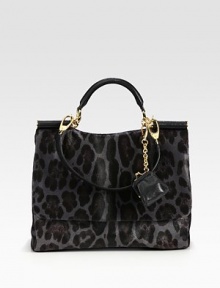 Luxurious haircalf in chic leopard-print with leather trim, perfect for all your essentials.Leather top handle, 5½ dropDetachable leather shoulder strap, 9 dropMagnetic snap flap closureMagnetic snap gussetsDetachable leather coin pouchOne inside zip pocketTwo inside open pocketsCotton lining13W X 11½H X 6DMade in Italy Luxurious haircalf in chic leopard-print with leather trim, perfect for all your essentials.Leather top handle, 5½ dropDetachable leather shoulder strap, 9 dropMagnetic snap flap closureMagnetic snap gussetsDetachable leather coin pouchOne inside zip pocketTwo inside open pocketsCotton lining13W X 11½H X 6DMade in Italy