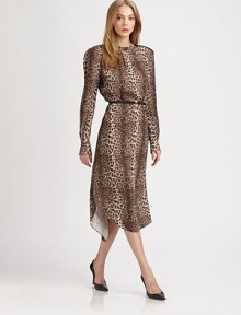 Floor-sweeping, silk-like silhouette in an ageless leopard print with a detachable belt and low cowlback. CrewneckLong sleeves with buttoned cuffsRemovable beltBack keyhole closure; cowlbackSlits at side hemFully linedAbout 33 from natural waistViscoseDry cleanImportedModel shown is 5'10 (177cm) wearing US size 0.