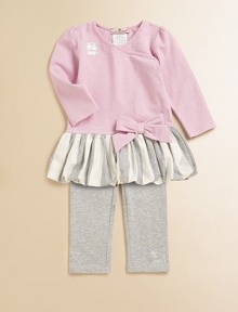 Wrap her to perfection in this ultra-soft set, equipped with a bow-adorned, ruffle-hem top and versatile leggings. CrewneckLong sleevesBow-adorned ruffle hemLeggings with elastic waistband83% cotton/7% Lycra®/5% polyester/5% spandexMachine washImported Wrap her to perfection in this ultra-soft set, equipped with a bow-adorned, ruffle-hem top and versatile leggings. CrewneckLong sleevesBow-adorned ruffle hemLeggings with elastic waistband83% cotton/7% Lycra®/5% polyester/5% spandexMachine washImported