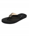 A shiny silver brand emblem accents the toe of Calvin Klein's Sammy thongs, making these sandals anything but basic.