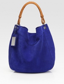 Rich suede in a sumptuous shade, with a woven leather handle for some rustic appeal.Top handle, 9 dropLogo-embossed metal luggage tagMagnetic top closureOne inside zip pocketOne inside snap pocketOne cellphone pocketCanvas lining12¼W X 12½H X 4¾DMade in Italy Rich suede in a sumptuous shade, with a woven leather handle for some rustic appeal.Top handle, 9 dropLogo-embossed metal luggage tagMagnetic top closureOne inside zip pocketOne inside snap pocketOne cellphone pocketCanvas lining12¼W X 12½H X 4¾DMade in Italy