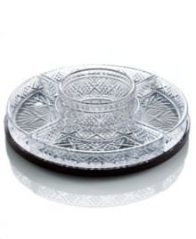 The sparkling sophistication of yesteryear makes a chic comeback with this lazy susan from Godinger. An intricate cut starburst pattern lends multi-faceted shine and true charm to any occasion. Center bowl features 4 compartments. The sparkling sophistication of yesteryear makes a chic comeback with this lazy susan from Godinger. An intricate cut starburst pattern lends multi-faceted shine and true charm to any occasion. Center bowl features 4 compartments.