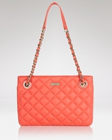 Bold hues are big news for spring. In quilted coral leather, kate spade new york's satchel packs a tropical punch that's totally on-trend.