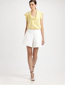 Crisp pleated linen, in a sporty, A-line skort style.Flat frontPleatsPanel constructionBack welt pocketConcealed side zip Inseam, about 6½97% linen/3% cottonDry cleanMade in ItalyModel shown is 5'11 (180cm) wearing US size 4. Crisp pleated linen, in a sporty, A-line skort style.Flat frontPleatsPanel constructionBack welt pocketConcealed side zip Inseam, about 6½97% linen/3% cottonDry cleanMade in ItalyModel shown is 5'11 (180cm) wearing US size 4.