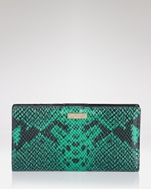 This kate spade new york wallet flaunts a perfect mix of style and substance, crafted of snake embossed leather. It's a wildly exotic essential. This kate spade new york wallet flaunts a perfect mix of style and substance, crafted of snake embossed leather. It's a wildly exotic essential.