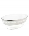 Pass the vegetables in a pleasing bone china bowl decorated with a delicate floral design with textured white beads and elegant platinum trim. From Lenox's dinnerware and dishes collection. Qualifies for Rebate