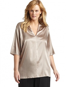 THE LOOKSmooth satin finishPullover styleV-neckBust dartsThree-quarter length sleevesTHE FITAbout 28 from shoulder to hemTHE MATERIAL95% silk/5% elastaneCARE & ORIGINDry cleanMade in Italy