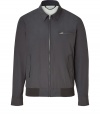Stylish zip up jacket in fine, cotton and nylon blend - Chic yet relaxed in cool, faded grey - Elegant blouson style with small collar and gathered contrast hem - Zip pocket at chest, flap pockets at sides - Long sleeves with snap cuffs, elegant pleat detail at back - Modern silhouette is straight and slim - A sleek, versatile staple - Pair with a button down or cashmere pullover and jeans, chinos or dressier trousers