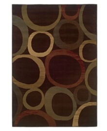 A lively, geometric motif forms a captivating backdrop, taking your contemporary decor in a boldly modern direction. Woven from super soft polypropylene for superior stain resistance and durability, this magnificent area rug from Sphinx will maintain its lush texture and rich coloration for years to come. (Clearance)