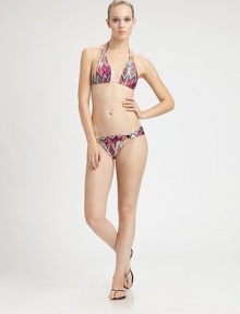 Triangle cups, sleek fabrication and gold hardware give this design a sexy-chic look.Halter strap ties at neckBack tie closure84% polyamide/16% elastaneFully linedHand washImported Please note: Bikini bottom sold separately. Triangle cups, sleek fabrication and gold hardware give this design a sexy-chic look.Halter strap ties at neckBack tie closure84% polyamide/16% elastaneFully linedHand washImported Please note: Bikini bottom sold separately.