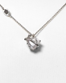 Add Juicy Couture's silver bow and heart pendant necklace to a favorite frock for some subtle sparkle. Add Juicy Couture's silver bow and heart pendant necklace to a favorite frock for some subtle sparkle.