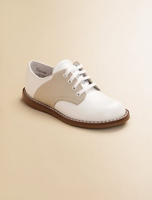 Timeless classics for school and play provide excellent support and cushioning in hard-wearing leather. Adjustrable front laces Padded insole Rubber traction sole Leather Imported Please note: It is recommended that you order ½ size smaller than measured. If your child measures a size 7.0, you may want to order a 6½. 