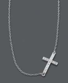 A modern update on the traditional cross. Studio Silver adds a simple twist by turning a symbolic cross pendant on its side. Crafted in sterling silver with sparkling crystal accents and rhodium plating to prevent tarnishing. Approximate length: 16 inches + 2-inch extender. Approximate drop: 1/2 inch. A modern update on the traditional cross. Studio Silver adds a simple twist by turning a symbolic cross pendant on its side. Crafted in sterling silver with sparkling crystal accents and rhodium plating to prevent tarnishing. Approximate length: 16 inches + 2-inch extender. Approximate drop: 1/2 inch.