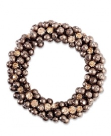 Stylish glass pearls in this stretch bracelet from Charter Club help it stand out. Crafted from gold-tone mixed metal, the cluster bracelet with its dark tones makes a subtle, but bold statement. Approximate length: 7 inches. Approximate diameter: 2-1/2 inches.