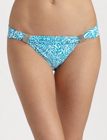 Smooth stretch knit features ocean inspired abstract graphics and silvertone bead accents.Mid-rise waistband Fold-over top with beaded accents Fully lined 85% Meryl nylon/15% spandex Fully lined Hand wash ImportedPlease note: Bikini top sold separately. Smooth stretch knit features ocean inspired abstract graphics and silvertone bead accents.Mid-rise waistband Fold-over top with beaded accents Fully lined 85% Meryl nylon/15% spandex Fully lined Hand wash ImportedPlease note: Bikini top sold separately.
