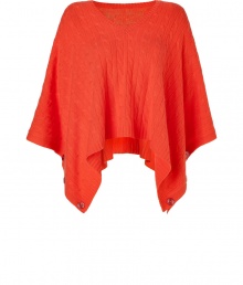 Luxe poncho in sumptuous cashmere - Fashionable mandarin orange color - Easily one of this seasons hottest styles - Cropped and flared, with a small V neck and elegant button closure - All-over cable knit - The chic sweater/cape hybrid can be worn in lieu of a traditional pullover or jacket - Layer over a long sleeve t-shirt and pair with cigarette pants and ankle booties Luxe poncho in sumptuous cashmere - Fashionable mandarin orange color - Easily one of this seasons hottest styles - Cropped and flared, with a small V neck and elegant button closure - All-over cable knit - The chic sweater/cape hybrid can be worn in lieu of a traditional pullover or jacket - Layer over a long sleeve t-shirt and pair with cigarette pants and ankle booties