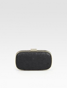 A simply chic style with a sparkly finish, perfect to dress up any look.Top clasp closureOne inside open pocketSuede lining7¾W X 4¾H X ½DImported A simply chic style with a sparkly finish, perfect to dress up any look.Top clasp closureOne inside open pocketSuede lining7¾W X 4¾H X ½DImported