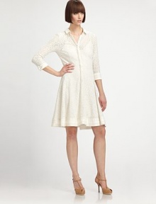 Fitted through the bodice and waist, this lightweight dress of delicate eyelet lace is a beautiful silhouette. Shirt collarLong sleeves with fold-back cuffsHidden placket button-down frontSolid band at hemAbout 21 from natural waist65% rayon/25% nylon/10% linenDry cleanImportedModel shown is 5'10.5 (179cm) wearing US size 4.