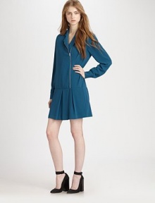 Short and chic, this fluid silhouette has an asymmetrical zipper, drop waist and a playfully pleated skirt. Notched collarAsymmetrical front zipperLong sleeves with buttoned cuffsDrop waistPleated skirtAbout 15 from natural waist60% triacetate/40% polyesterDry cleanImportedModel shown is 5'10 (177cm) wearing US size 4. Short and chic, this fluid silhouette has an asymmetrical zipper, drop waist and a playfully pleated skirt. Notched collarAsymmetrical front zipperLong sleeves with buttoned cuffsDrop waistPleated skirtAbout 15 from natural waist60% triacetate/40% polyesterDry cleanImportedModel shown is 5'10 (177cm) wearing US size 4.