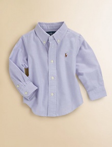 A classic button-down design is crafted in vibrant woven cotton for a clean, preppy style.Button-down collarLong sleeves with barrel cuffsButton-frontBox-pleated backShirttail hemCottonMachine washImported Please note: Number of buttons may vary depending on size ordered. A classic button-down design is crafted in vibrant woven cotton for a clean, preppy style.Button-down collarLong sleeves with barrel cuffsButton-frontBox-pleated backShirttail hemCottonMachine washImported Please note: Number of buttons may vary depending on size ordered.