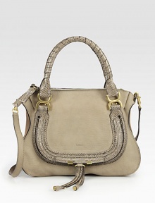 Luxurious python upgrades this leather satchel with sleek goldtone hardware and a detachable strap. Detachable leather shoulder strap, 18½ dropDouble python-wrapped top handles, 6 dropTop zip closureOne outside open pocketOne inside zip pocketOne inside open pocketCotton lining13¾W X 11H X 4½DMade in Italy Luxurious python upgrades this leather satchel with sleek goldtone hardware and a detachable strap. Detachable leather shoulder strap, 18½ dropDouble python-wrapped top handles, 6 dropTop zip closureOne outside open pocketOne inside zip pocketOne inside open pocketCotton lining13¾W X 11H X 4½DMade in Italy