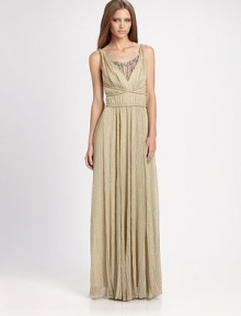 Grecian-inspired necklace embellishment and crisscrossed, twisted detailing define this metallic-speckled flowing gown.Twisted strapsOpen backCenter back zipperAbout 42 from natural waist50% polyester/50% metallic fibersFully linedDry cleanMade in USA of imported fabricModel shown is 5'9 (175cm) wearing US size 4.OUR FIT MODEL RECOMMENDS ordering one size down as this style runs large. Grecian-inspired necklace embellishment and crisscrossed, twisted detailing define this metallic-speckled flowing gown.Twisted strapsOpen backCenter back zipperAbout 42 from natural waist50% polyester/50% metallic fibersFully linedDry cleanMade in USA of imported fabricModel shown is 5'9 (175cm) wearing US size 4.OUR FIT MODEL RECOMMENDS ordering one size down as this style runs large.