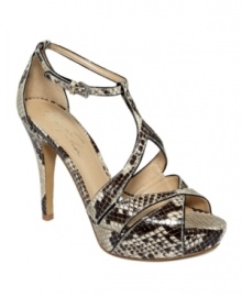 Shake it up when things get dull with the Tranquil platform sandal by Marc Fisher. An exotic snake print finish and elevated heel round out the look.