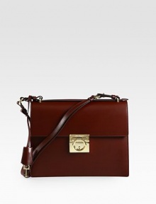 A boxy frame in luxuriously smooth leather with goldtone signature hardware.Top handles, 1 dropDetachable shoulder strap, 11½ dropFlip-lock flap closureOne open pocket under flapThree inner compartmentsFully lined10½W X 8H X 3DMade in Italy A boxy frame in luxuriously smooth leather with goldtone signature hardware.Top handles, 1 dropDetachable shoulder strap, 11½ dropFlip-lock flap closureOne open pocket under flapThree inner compartmentsFully lined10½W X 8H X 3DMade in Italy