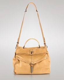 Toe the line between modern and vintage style with this leather satchel from Kooba. It's slouchy shape and ultra-soft leather have a retro vibe while distinctive details are wholly of the moment. Toe the line between modern and vintage style with this leather satchel from Kooba. It's slouchy shape and ultra-soft leather have a retro vibe while distinctive details are wholly of the moment.