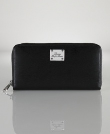 Lauren by Ralph Lauren's chic zip-around silhouette adds a modern dimension to the sophisticated Newbury wallet, crafted for a luxurious look and feel in sumptuous textured leather. Lauren by Ralph Lauren's chic zip-around silhouette adds a modern dimension to the sophisticated Newbury wallet, crafted for a luxurious look and feel in sumptuous textured leather.